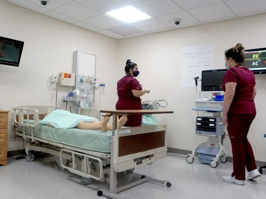 two nurses in a hospital room